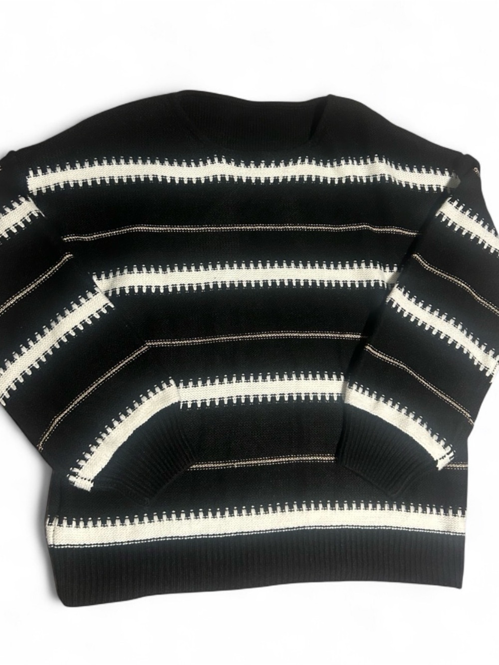 Oversized Striped Knit Sweater – Black & White
Level